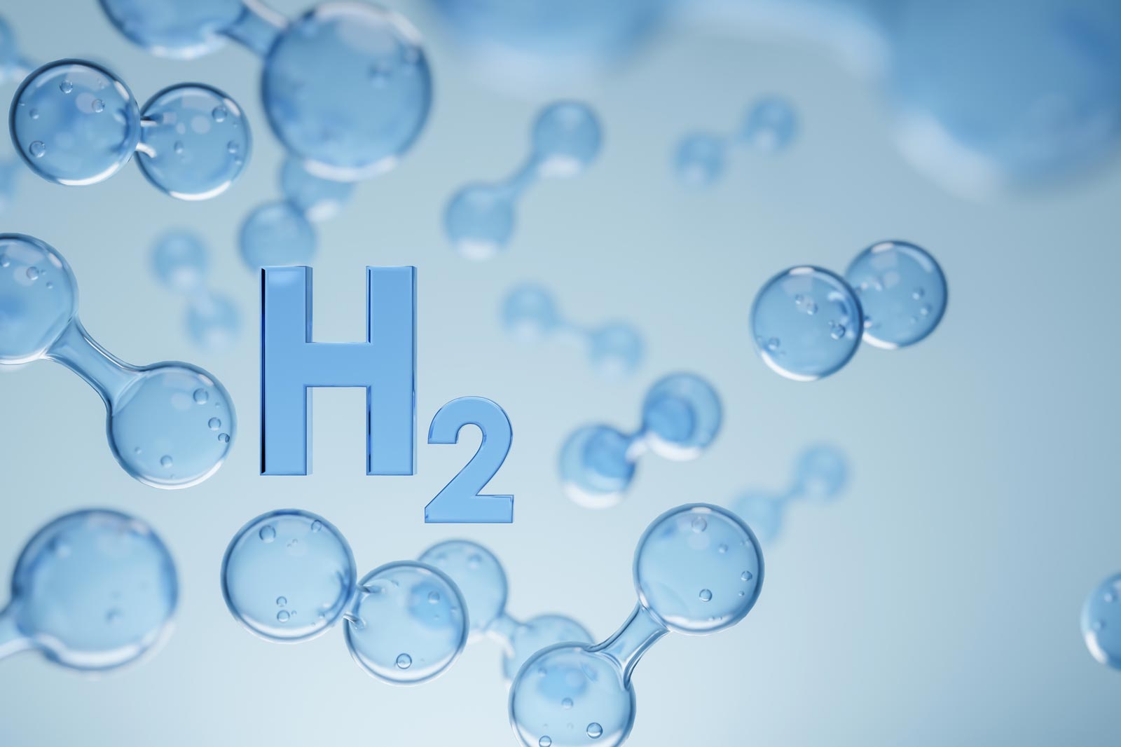 En abstrakt representation av vätemolekyler med 'H2' tydligt synligt, mot en mjuk blå bakgrund.